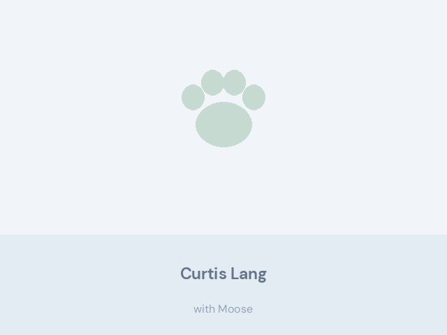 Curtis Lang at home with Moose